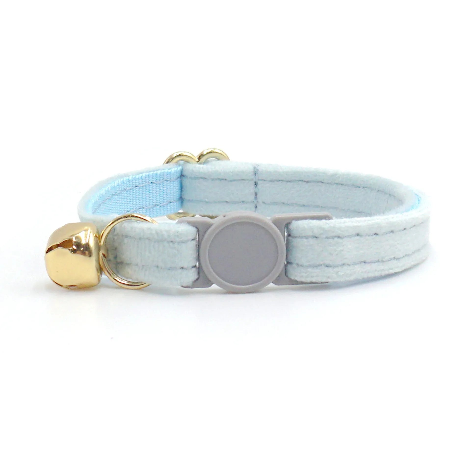 Cat collar with safety buckle and bell, available in corduroy or velvet, in multiple colours for small cats.