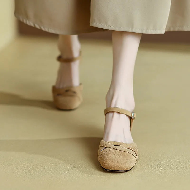Women's Roman sandals with buckle closure in apricot colour showing round toe and shallow mouth design