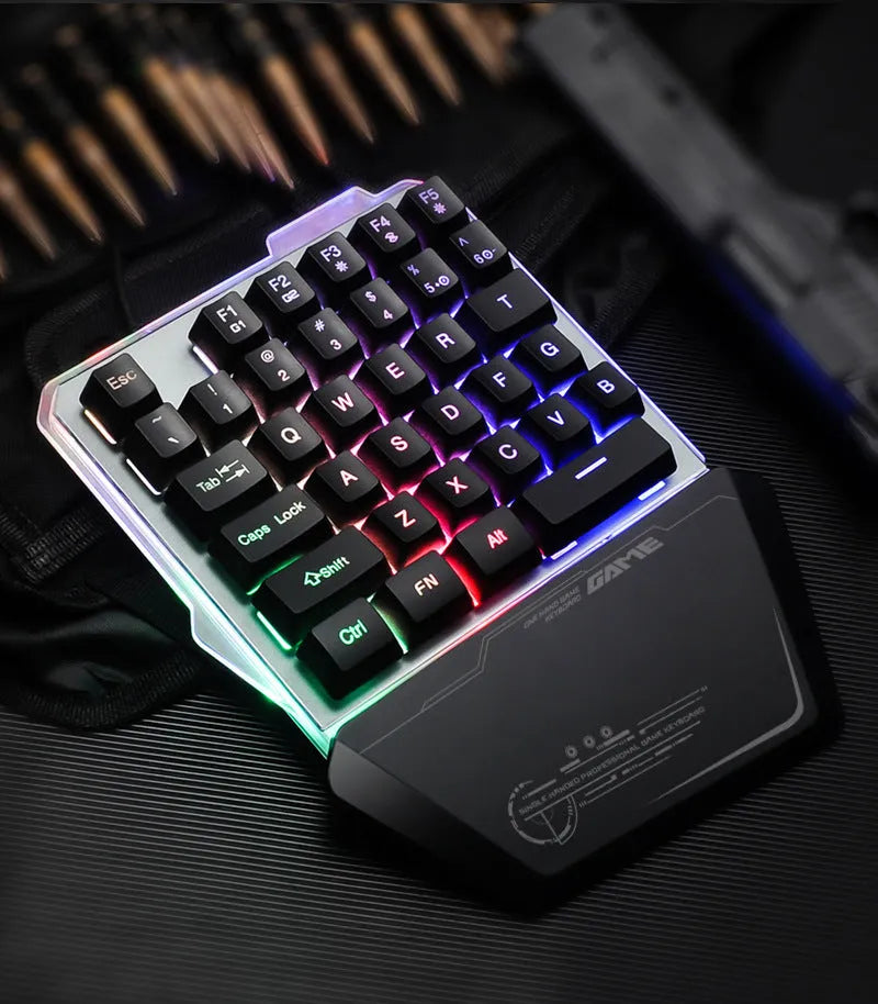 Black Robotic G40 one-handed mechanical keyboard with RGB backlit keys on a desk