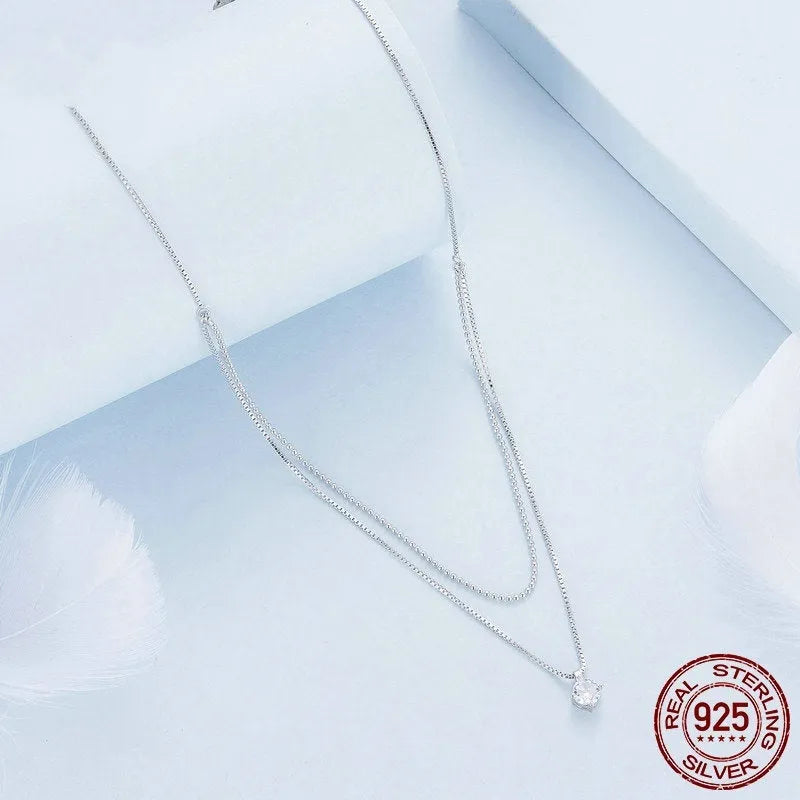 Sterling silver double-layer necklace with pearl chain design and pendant