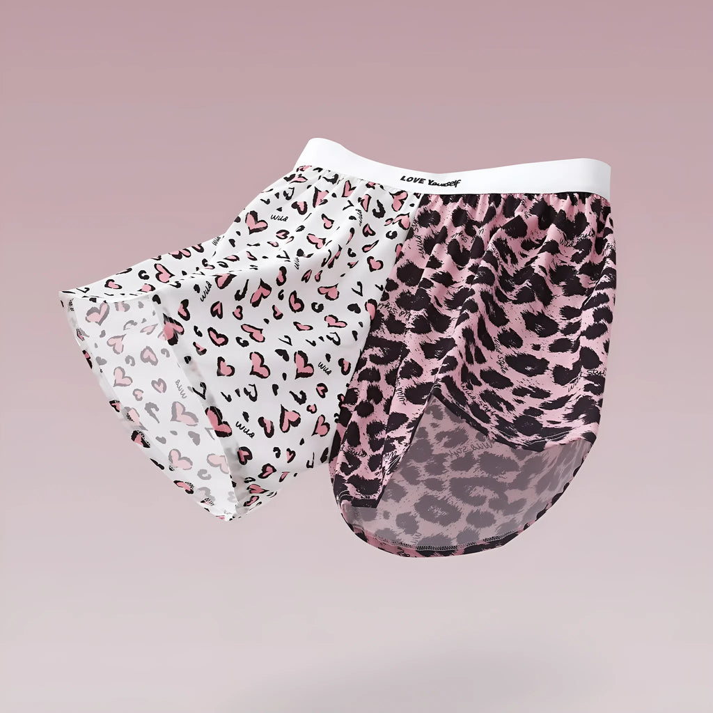 Men's leopard print woven boxer briefs in ice silk fabric showing loose casual fit