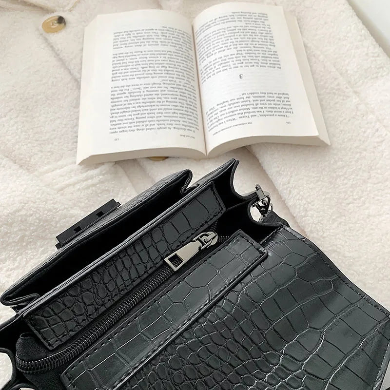 Vintage-style PU leather crossbody bag in black, shown with dimensions for scale.