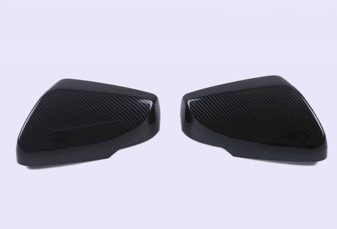 Pair of ABS rearview mirror covers for Cadillac CT5 CT6 in carbon fibre, silver, and rain frame styles.