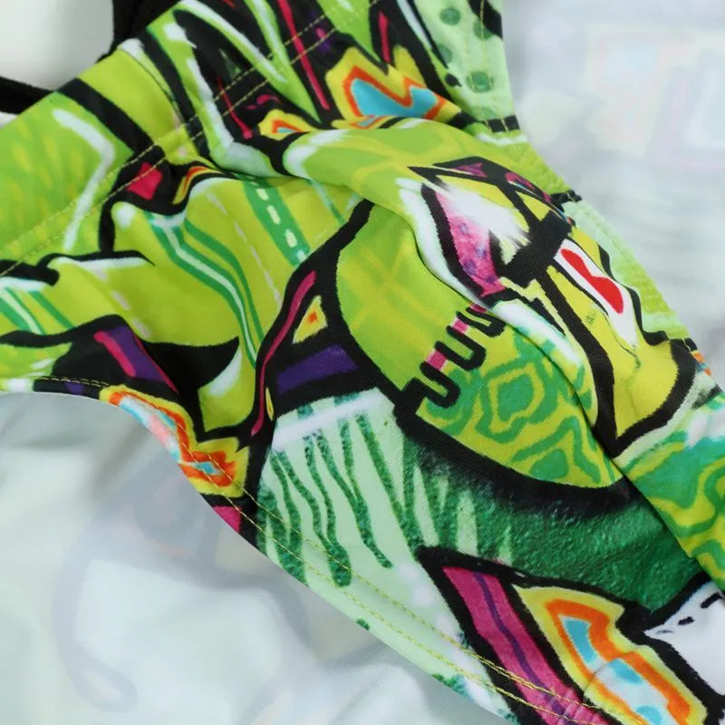 Men's printed swimming trunks in a choice of patterns including skull, streamer, cyber, and ice cream designs.