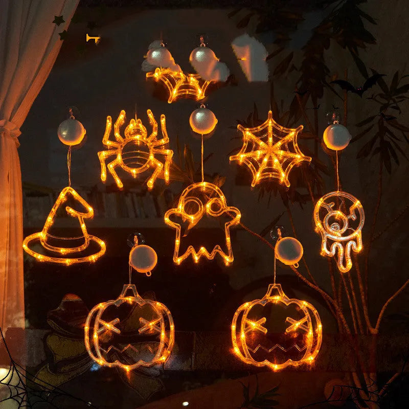 Halloween window hanging LED lights set with seven battery-powered horror-themed decorative pieces