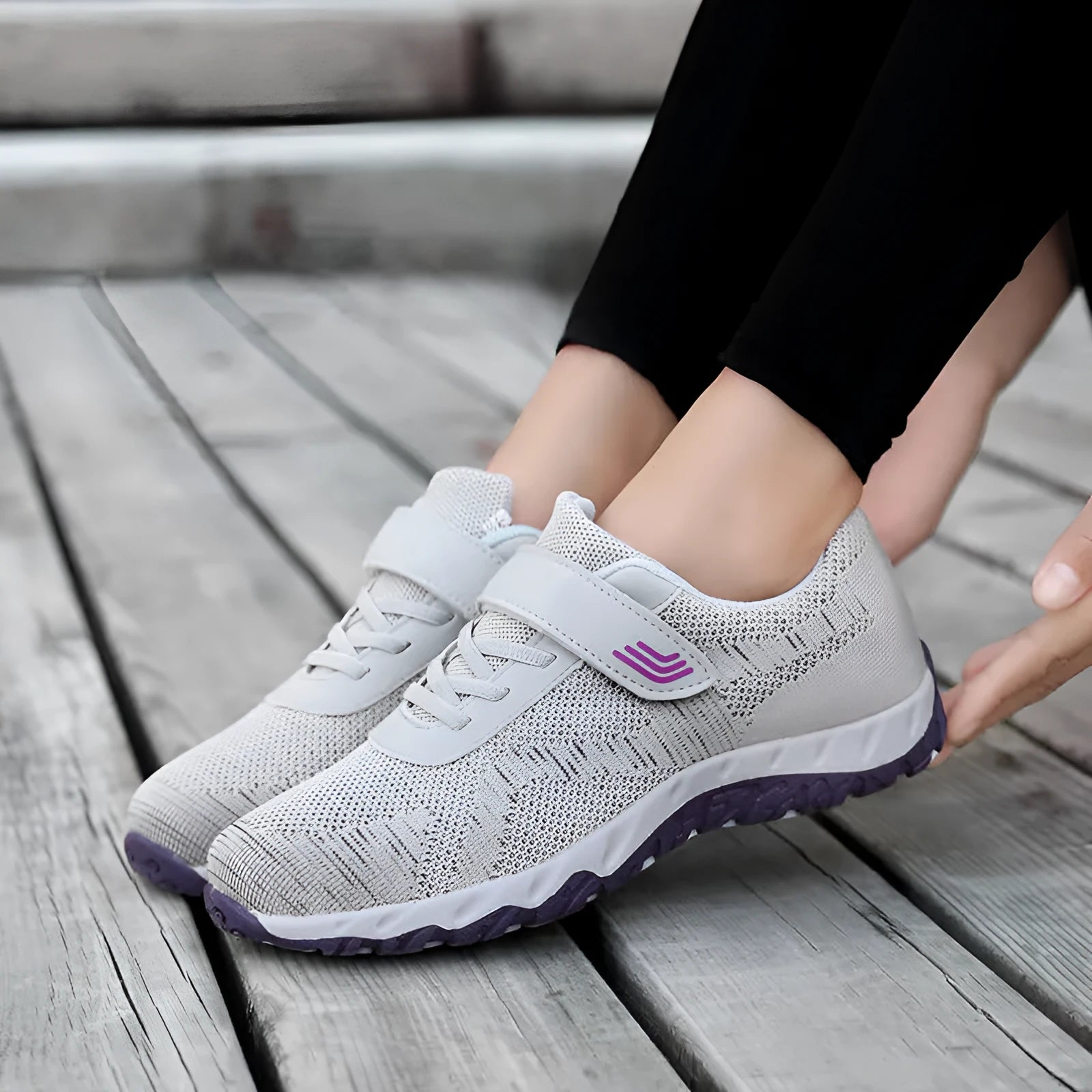 Women's low-top casual shoes with Velcro strap, wedge heel, and breathable mesh upper in a grey purple colour.