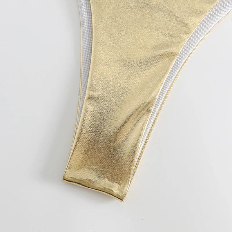 Women's lace-up bikini in metallic colour with adjustable ties and polyester fabric.