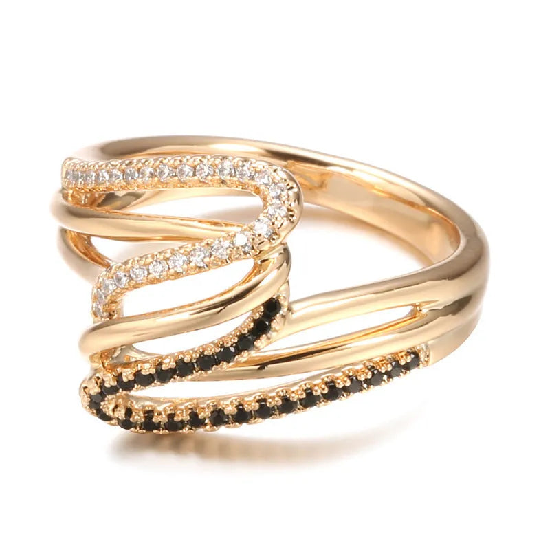 Gold tone women's copper ring with micro-inlaid sparkling zircon stones on a finger.