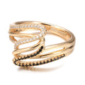 Gold tone women's copper ring with micro-inlaid sparkling zircon stones on a finger.