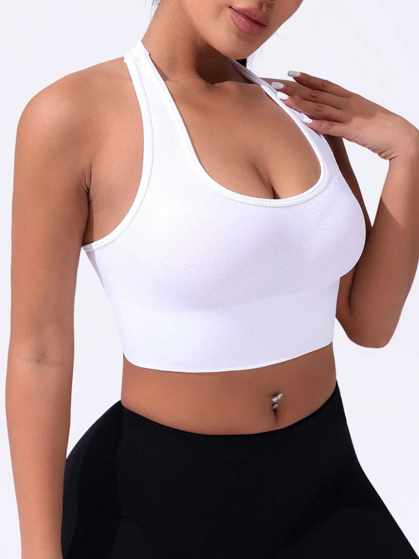 Black women's sports bra with moulded cups and double-shoulder straps for running and yoga