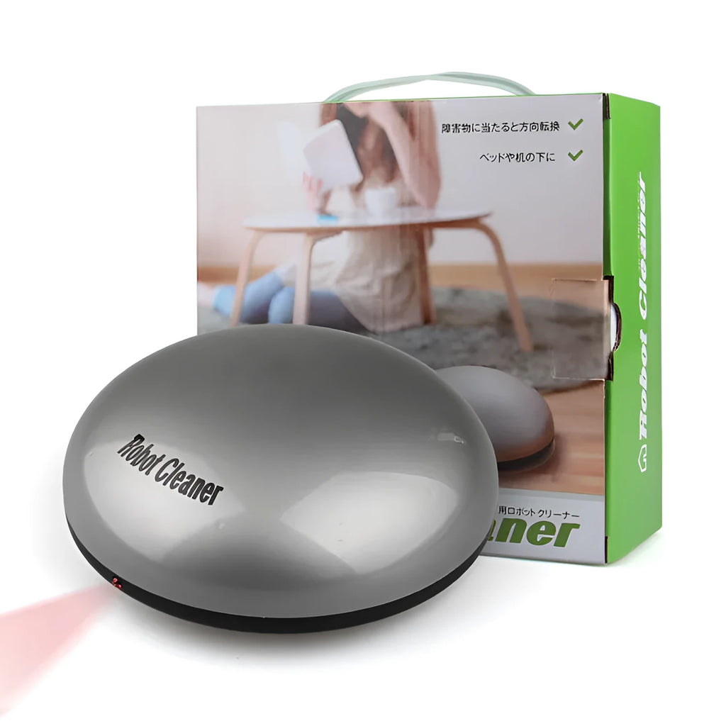 Compact silver automatic vacuum cleaner robot on a wooden floor