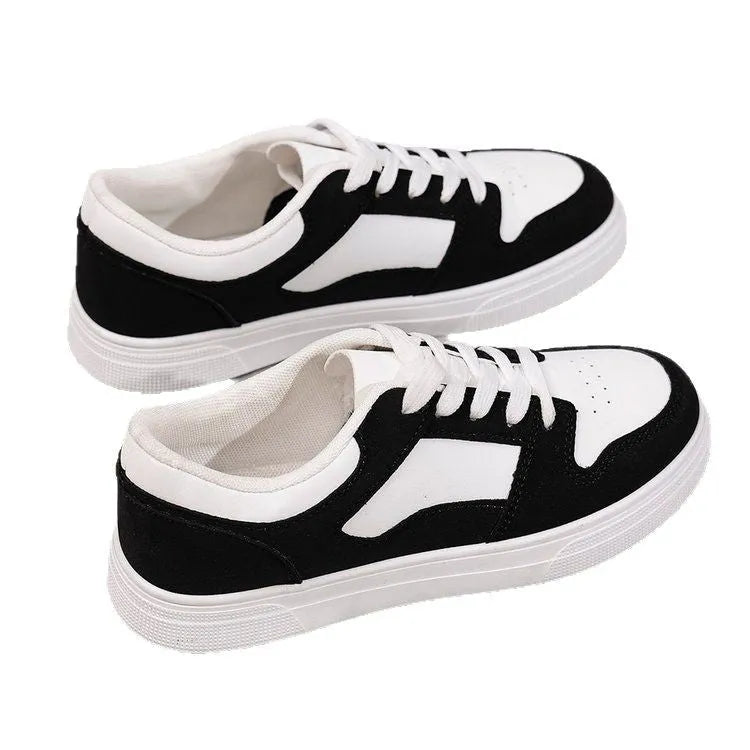 Black women's casual sports shoes with flat rubber sole and lace-up front