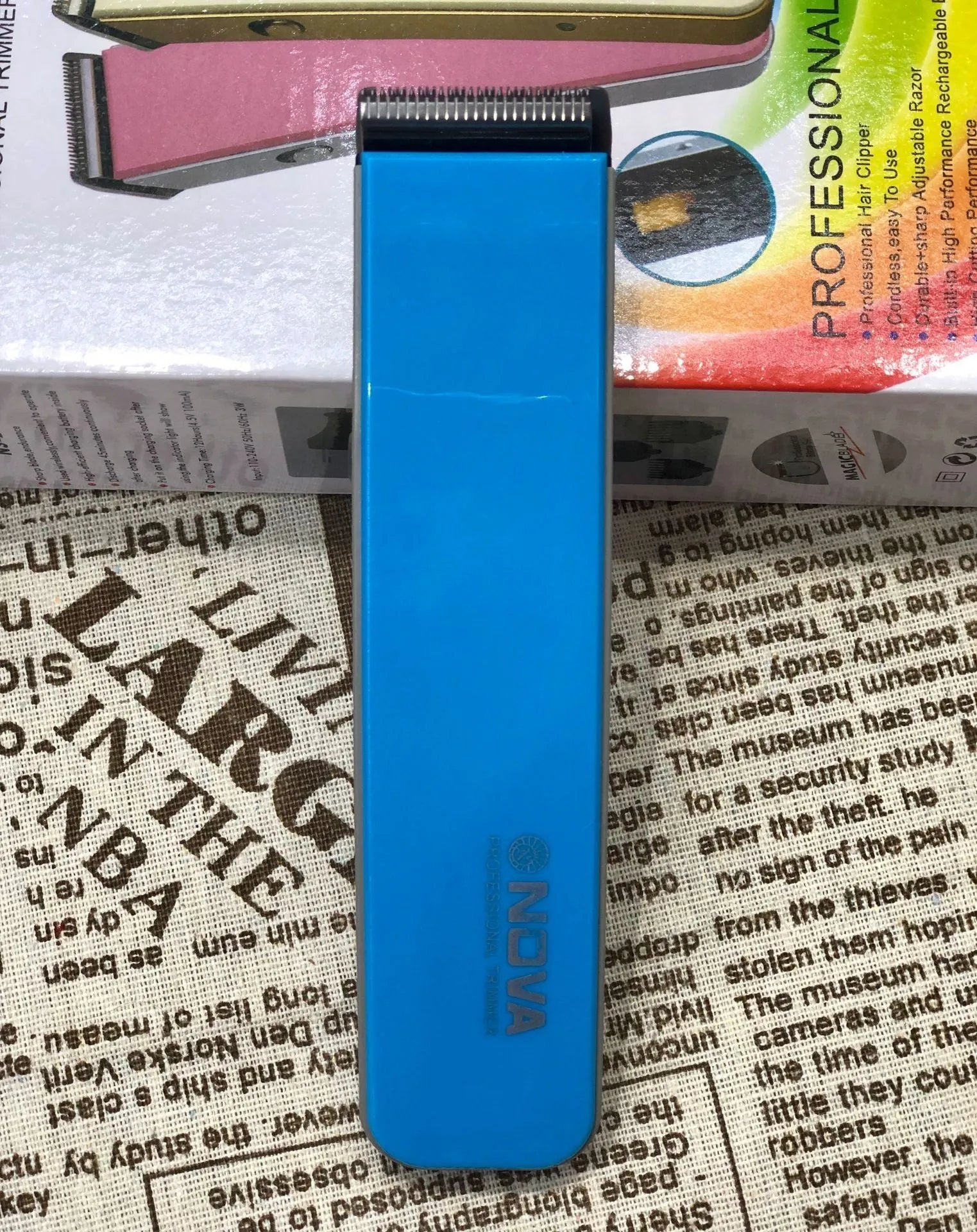 Electric hair clipper with removable blade head in multiple colour options showing 155mm length
