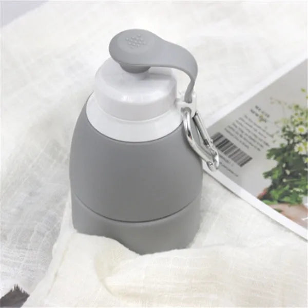 Silicone folding water bottle showing extended and compressed states in blue colour