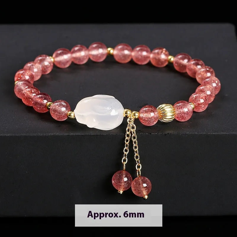 Women's strawberry quartz agate bracelet with white rabbit charms and 6mm geometric beads