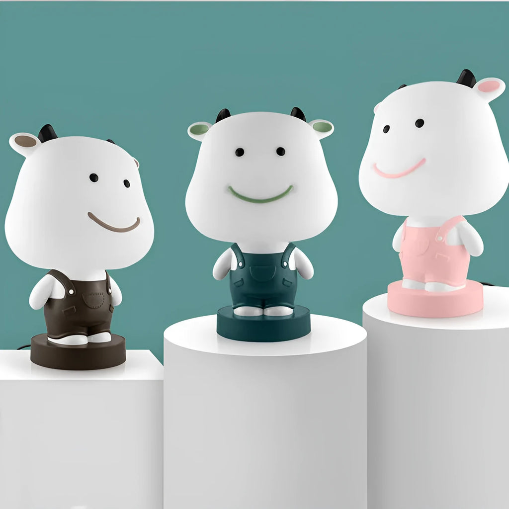Cartoon animal table lamp in bear, cattle, rabbit or tiger designs with LED light and plastic shade