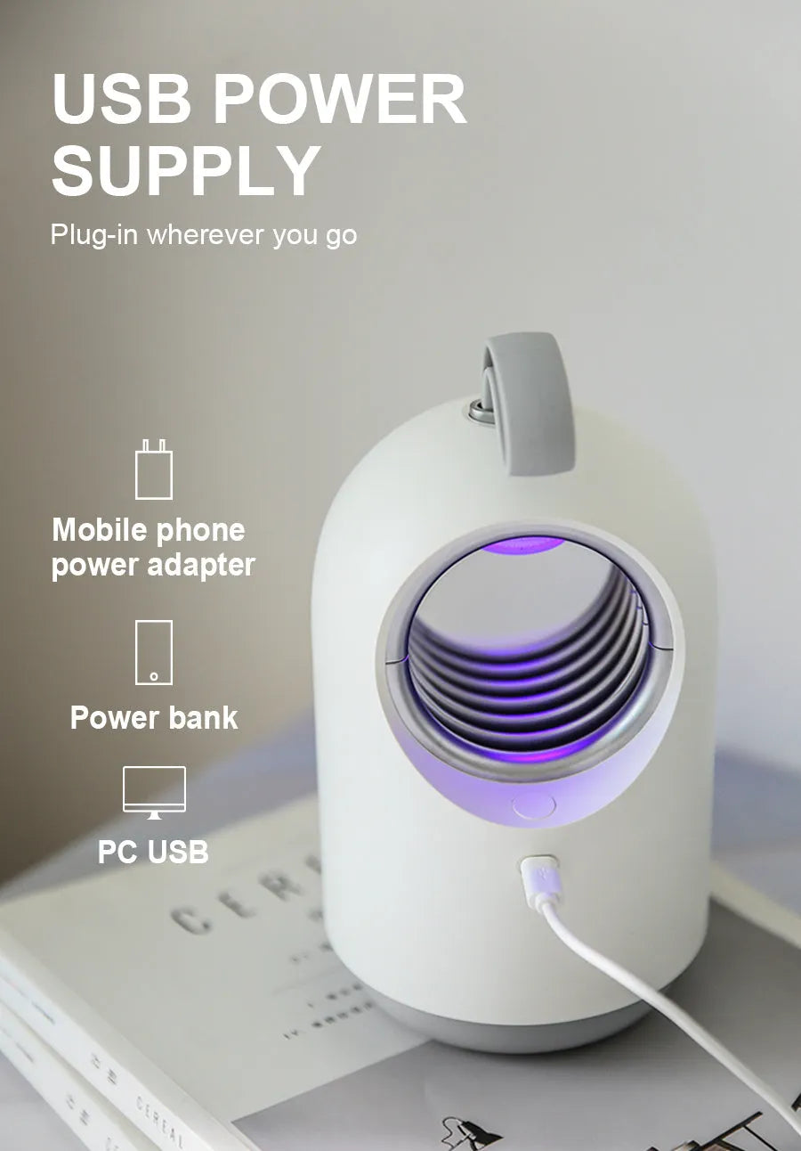 White and blue indoor mosquito killer lamp with UV light and silicone carrying handle