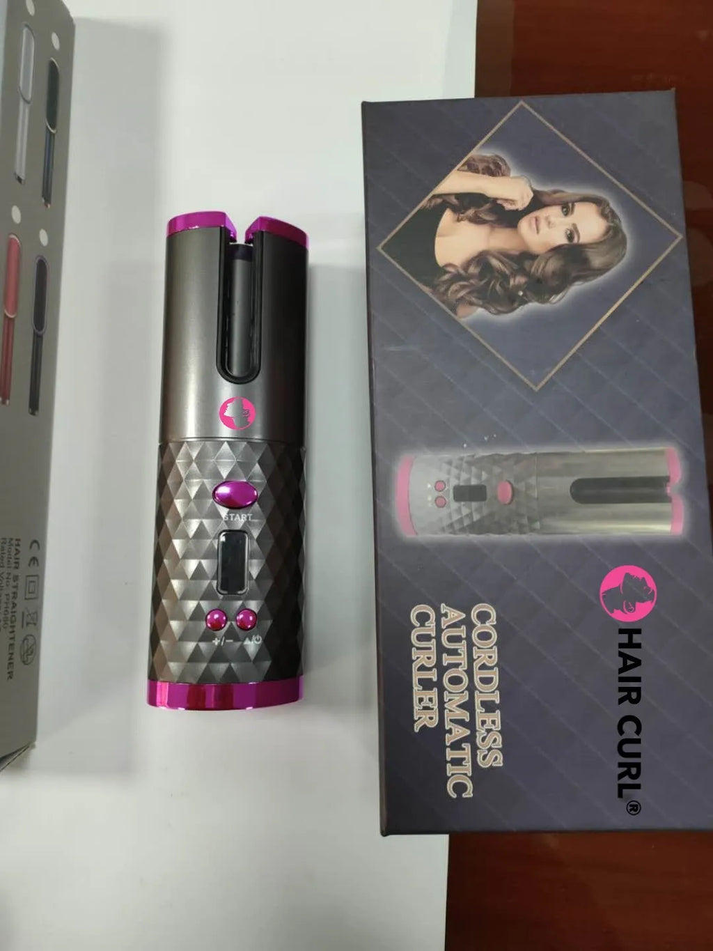Automatic wireless curling iron with rechargeable battery in black colour