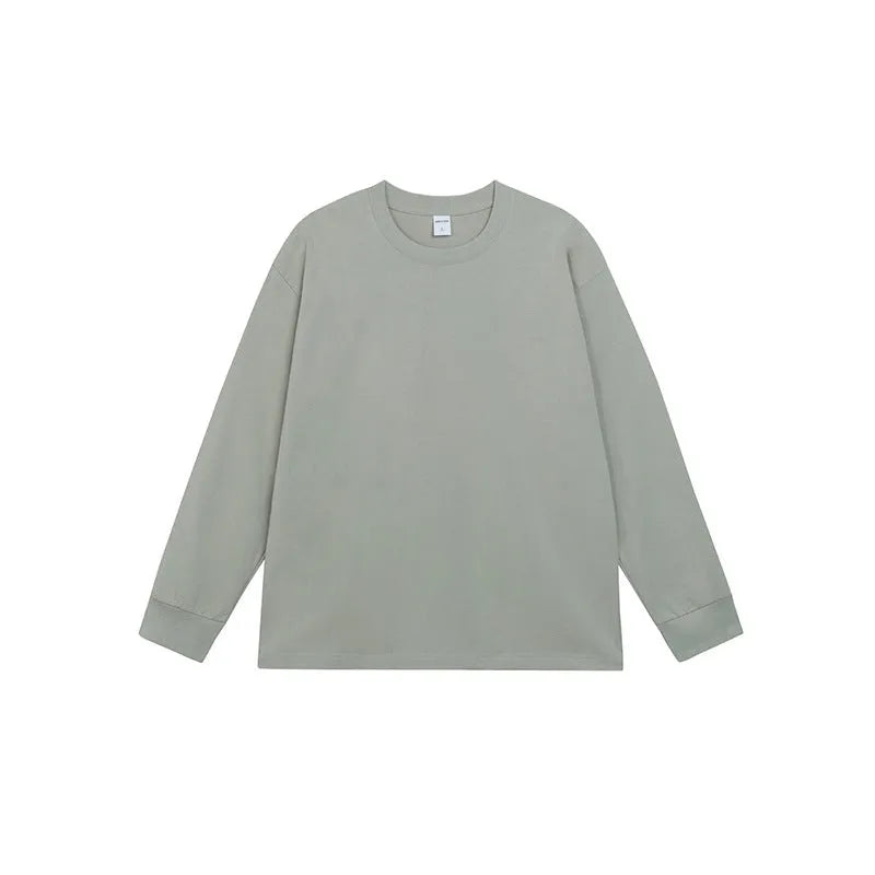 Men's solid colour pure cotton long-sleeved t-shirt shown in loose fit on a hanger.