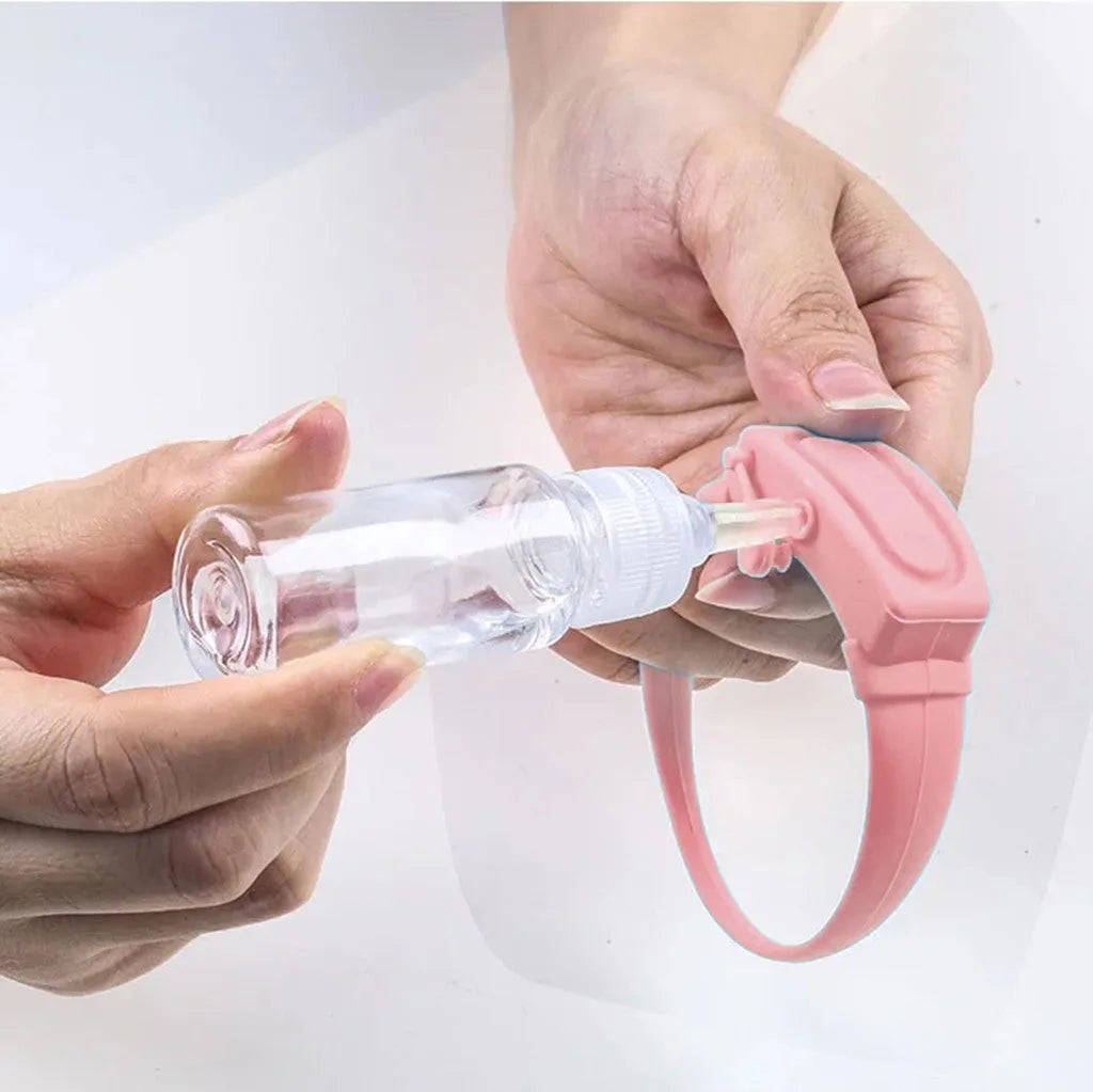 Portable hand sanitizer dispenser silicone wristband with refill cap, black band holding 6mL bottle