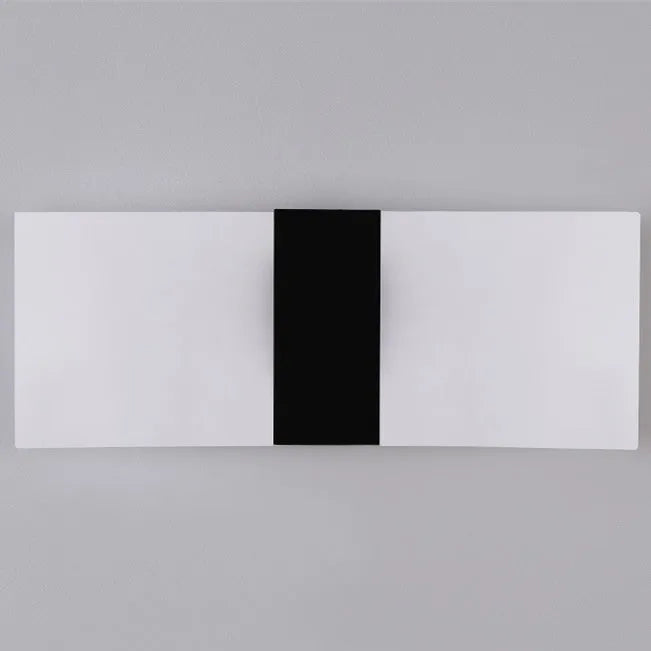 Modern acrylic LED wall lamp in black gold or silver with dual warm white light colours