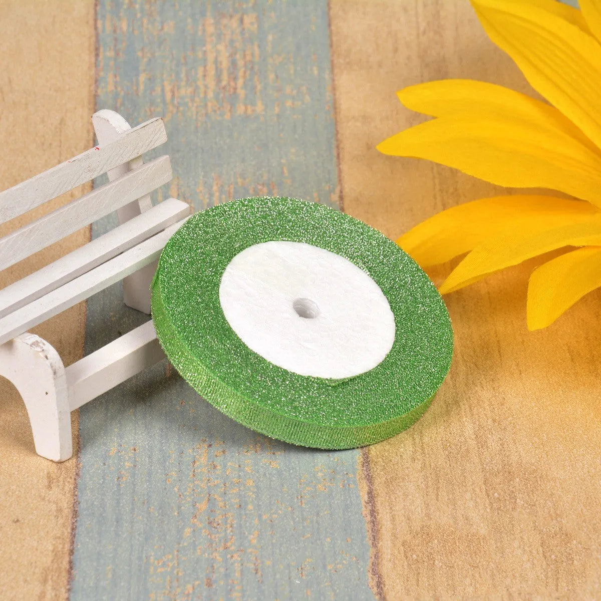 Colourful green onion pattern polyester ribbon spool with metallic gold or silver wire detailing.