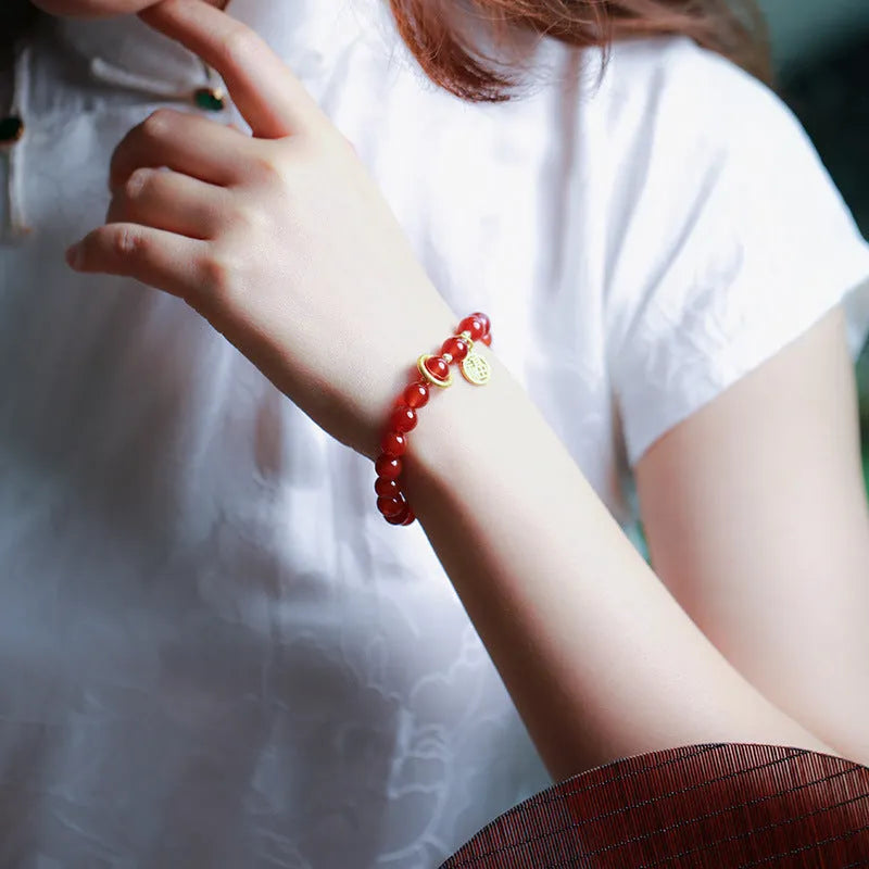 Natural red agate bracelet with woven beads in national style, showing 8MM and 10MM size options with blessing card.