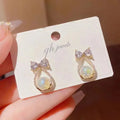 Women's alloy bow earrings with electroplating finish in colour as shown in main image