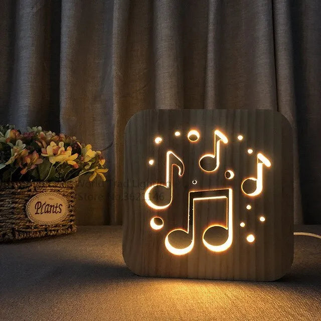 Square pine wood USB LED lamp emitting warm white light on a wooden surface.