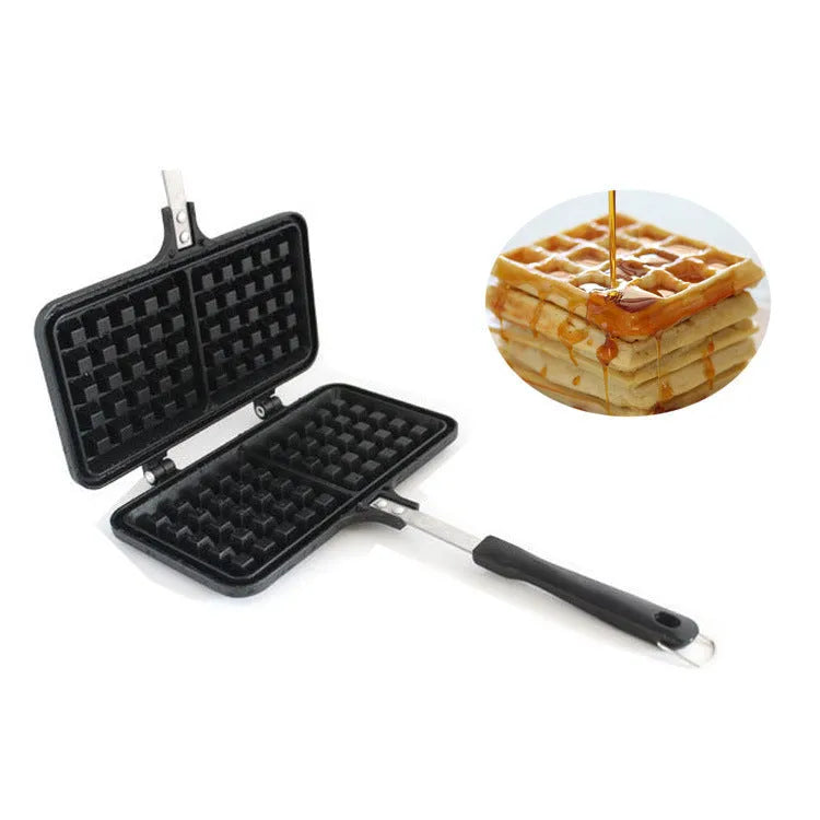 Black aluminium alloy waffle cake mold with nonstick plates and locking handle on gas stove