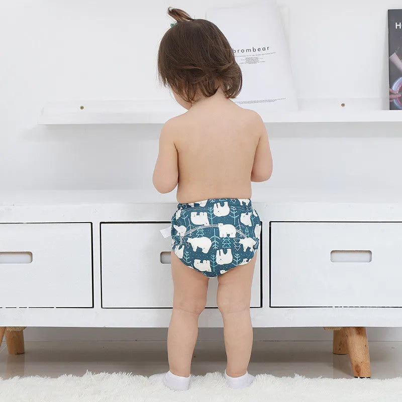 Baby training learning pants in cotton gauze with TPU waterproof layer, shown in panda print on white background