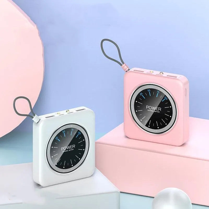 Compact mint green alloy power bank with a digital clock display, showing time and charging ports.