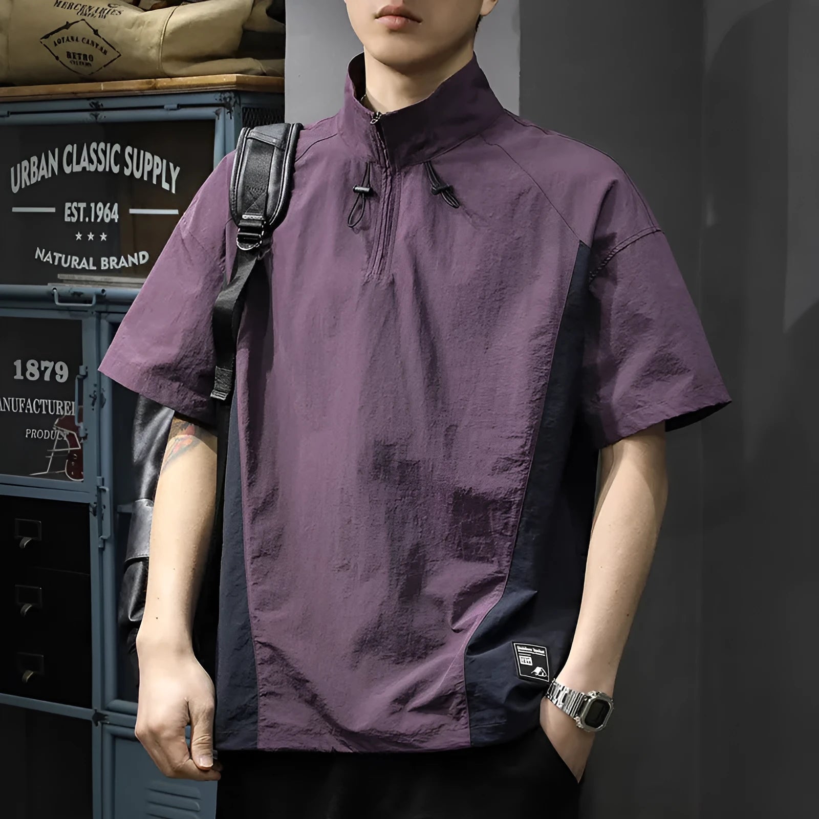 Brown men's half-zip stand collar short sleeve shirt with a fleece lining.