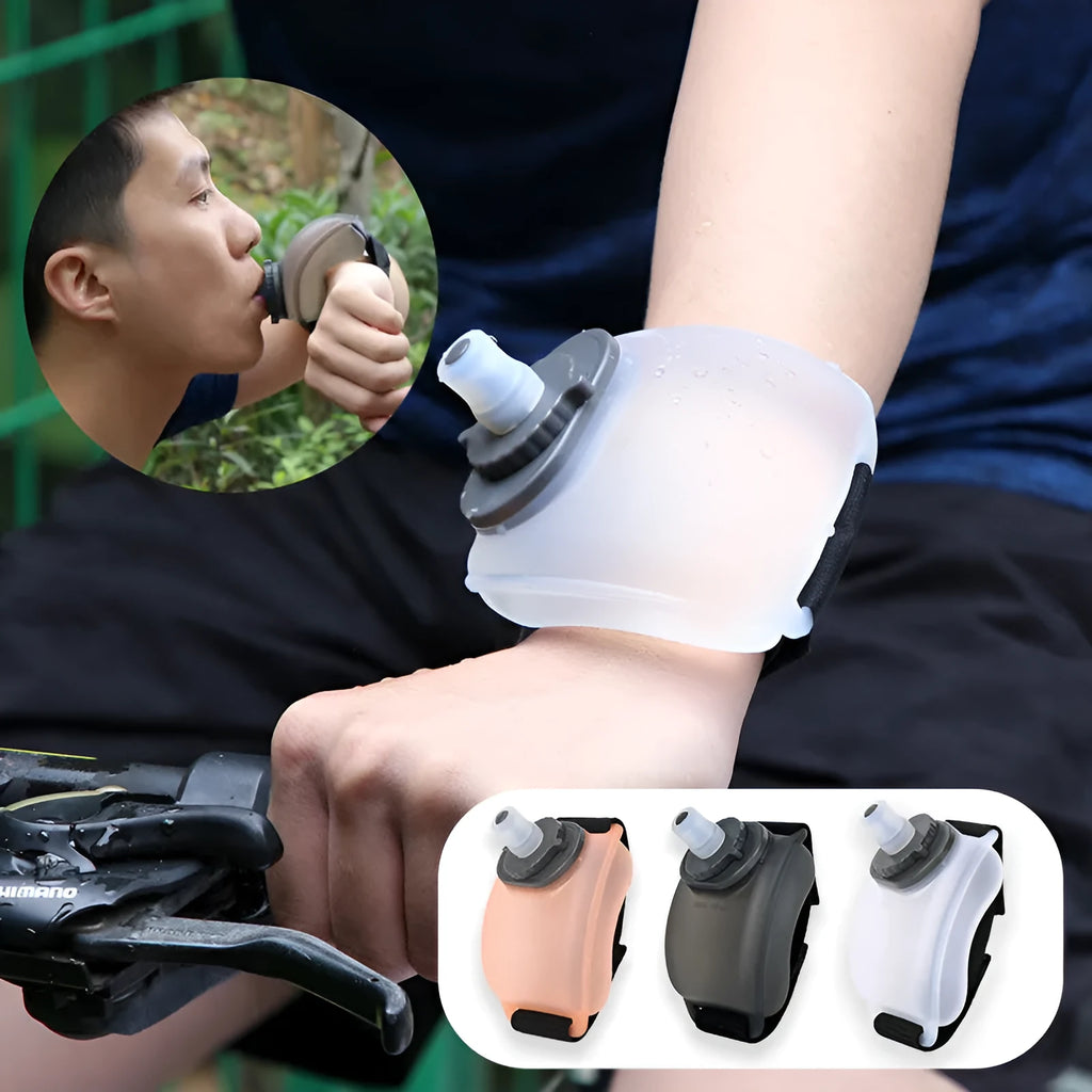 Orange wrist water bottle with Velcro strap shown on person's wrist during running activity