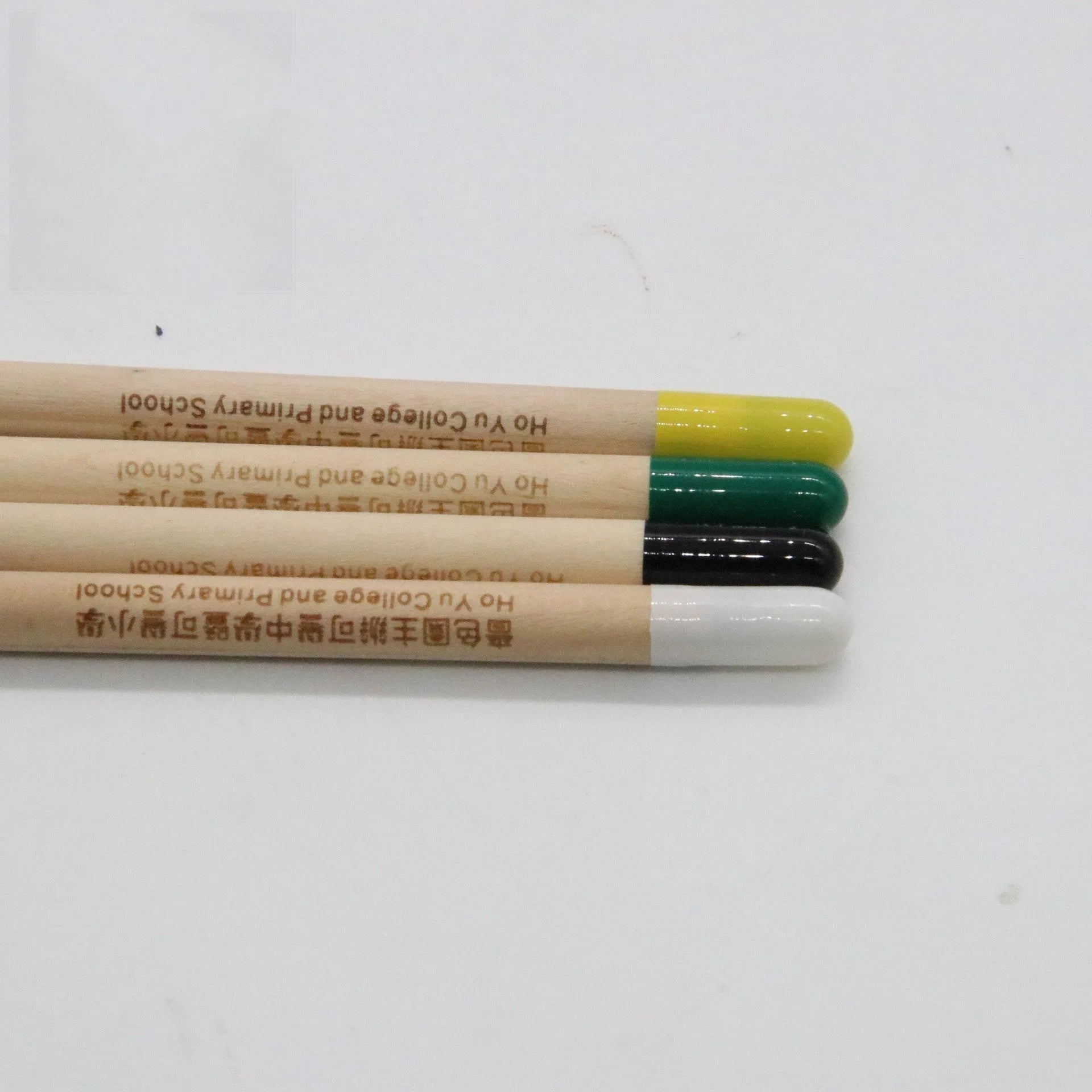 Seed Pencil with coloured degradable capsule tip containing a plant seed, alongside HB refill.