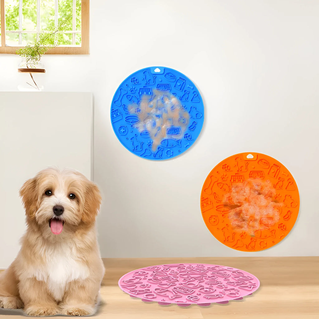 Round silicone pet licking mat with suction cups on a flat surface.
