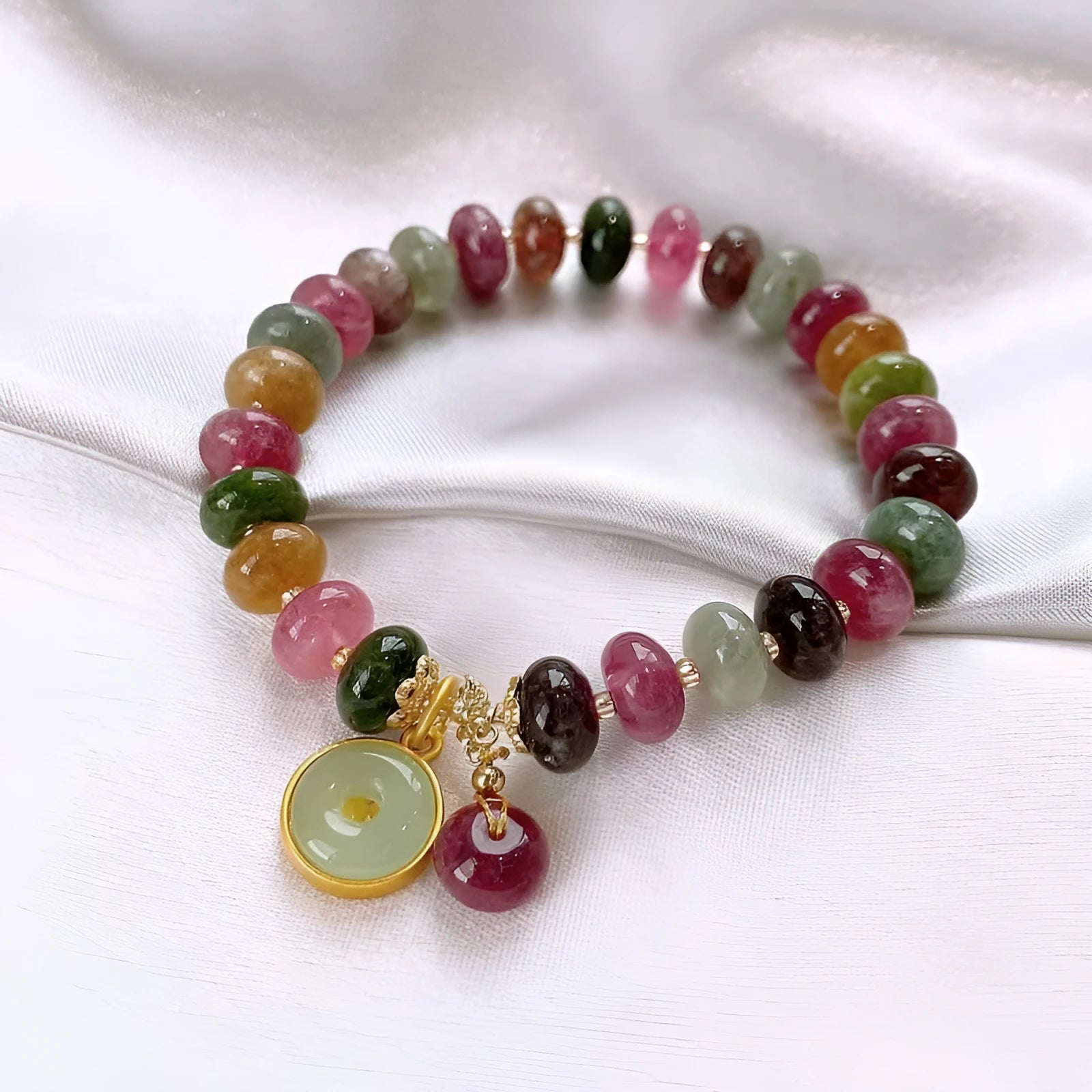 Handmade colourful tourmaline bracelet with rabbit pendant and round abacus beads