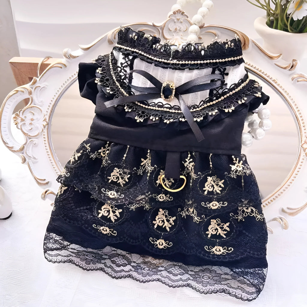Golden layered gothic-style skirt for a small dog or cat on a mannequin, showing princess cut.