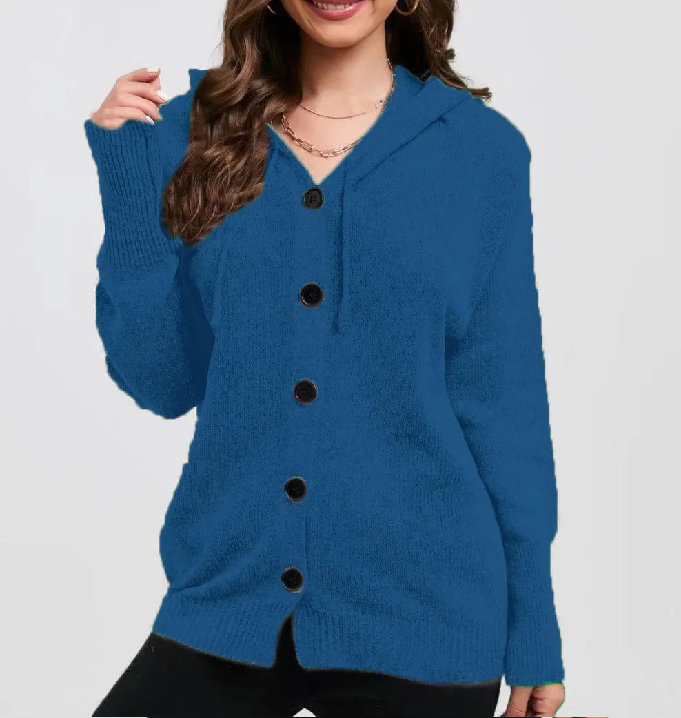 Women's loose-fit hooded cardigan in thick coloured cotton, shown in a solid colour with long sleeves.