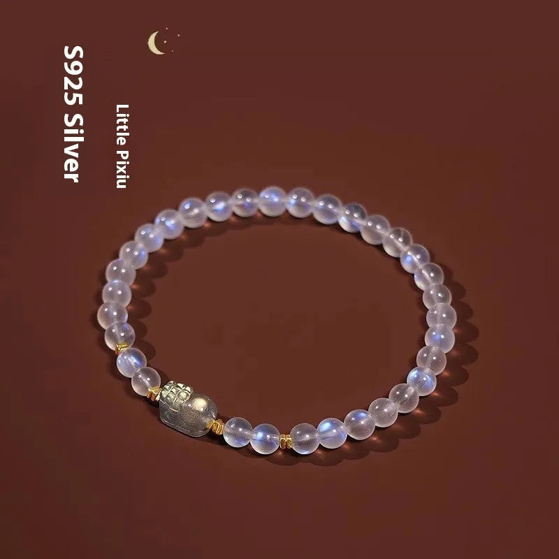 Women's moonstone bracelet with zodiac animal modelling in a national style.