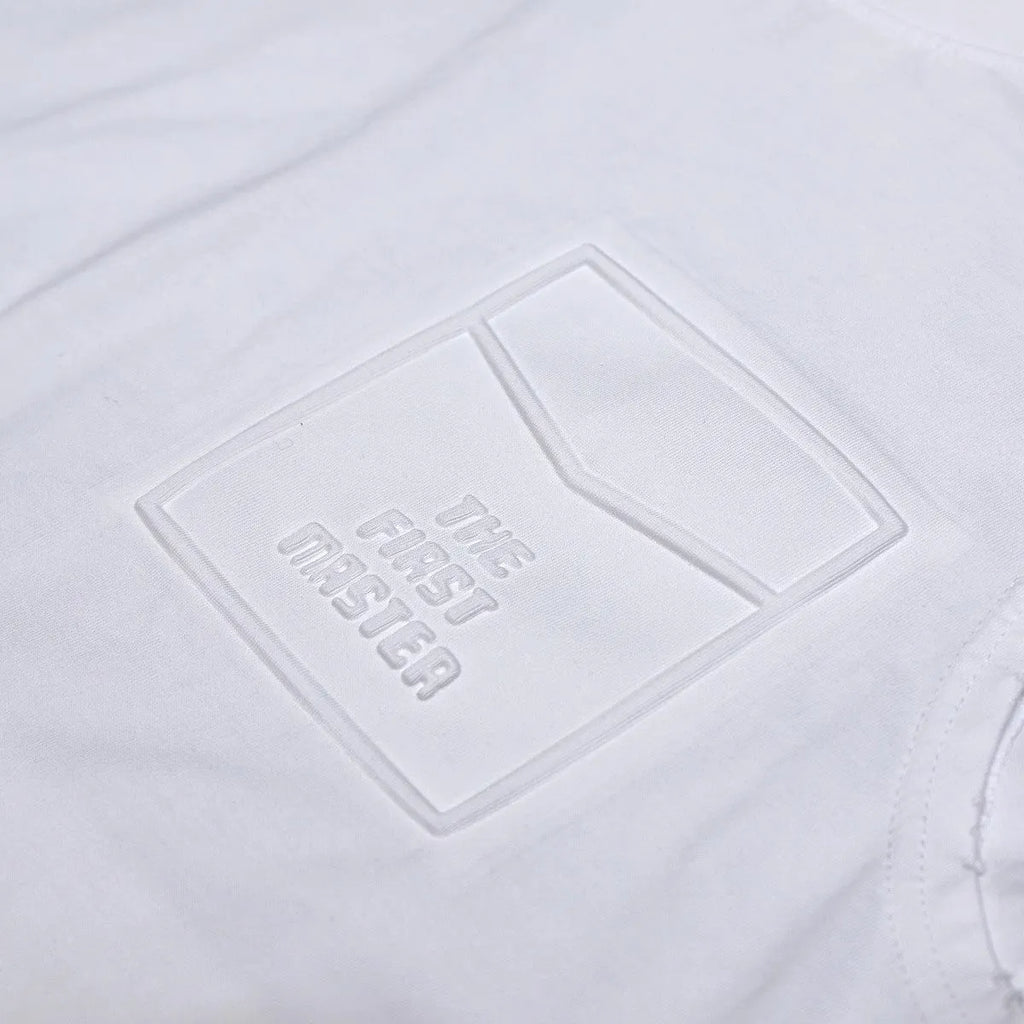 Men's solid black cotton sleeveless t-shirt with loose fit and straight hem on a white background.