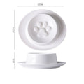 Green ceramic anti-choking slow food bowl for cats and dogs on a flat surface.