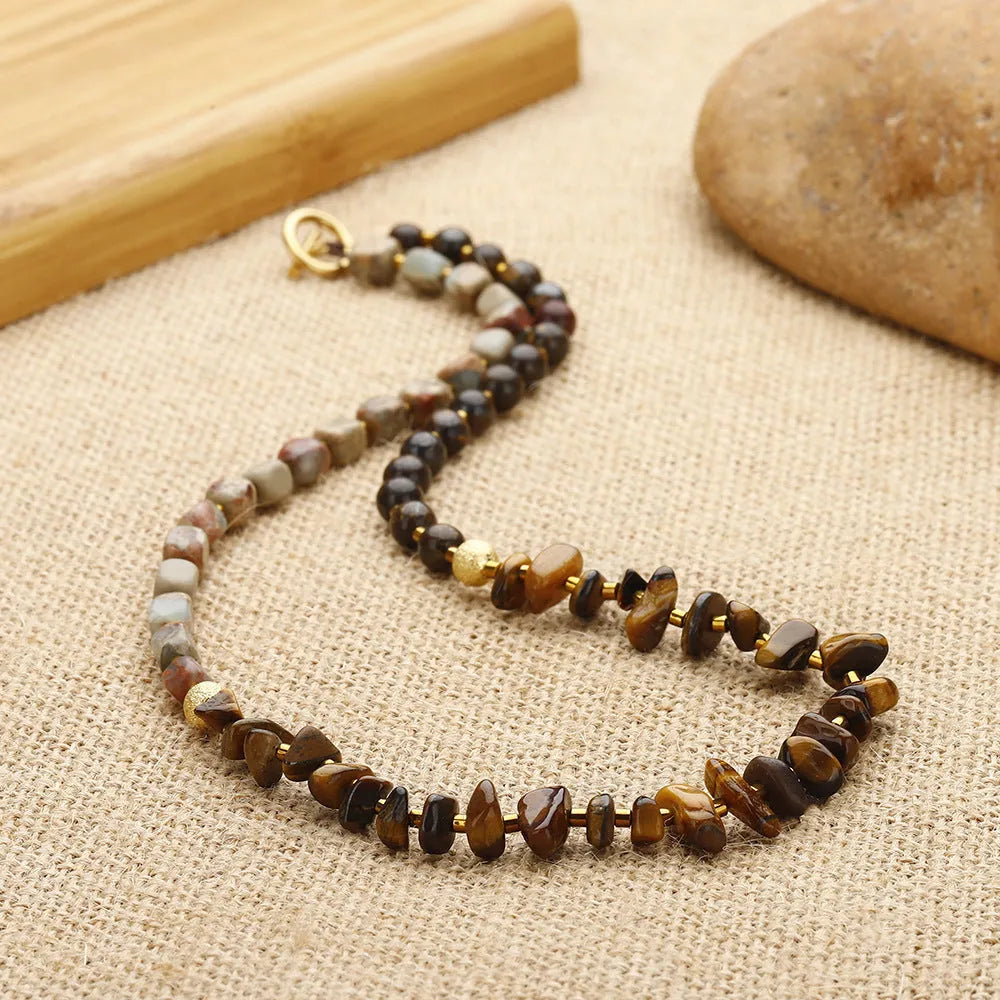 Handmade tigereye and bronze geometric bracelet with texture and hitch elements