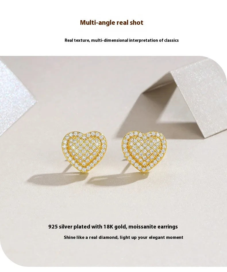Pair of golden heart-shaped moissanite stud earrings on S925 sterling silver posts