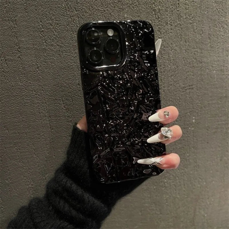 Tin foil pleated silicone phone case for Apple iPhone in black with embossed finish