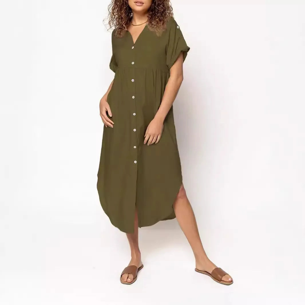 A loose fit, solid colour midi dress with a button front detail, shown in one of eight available colour options.