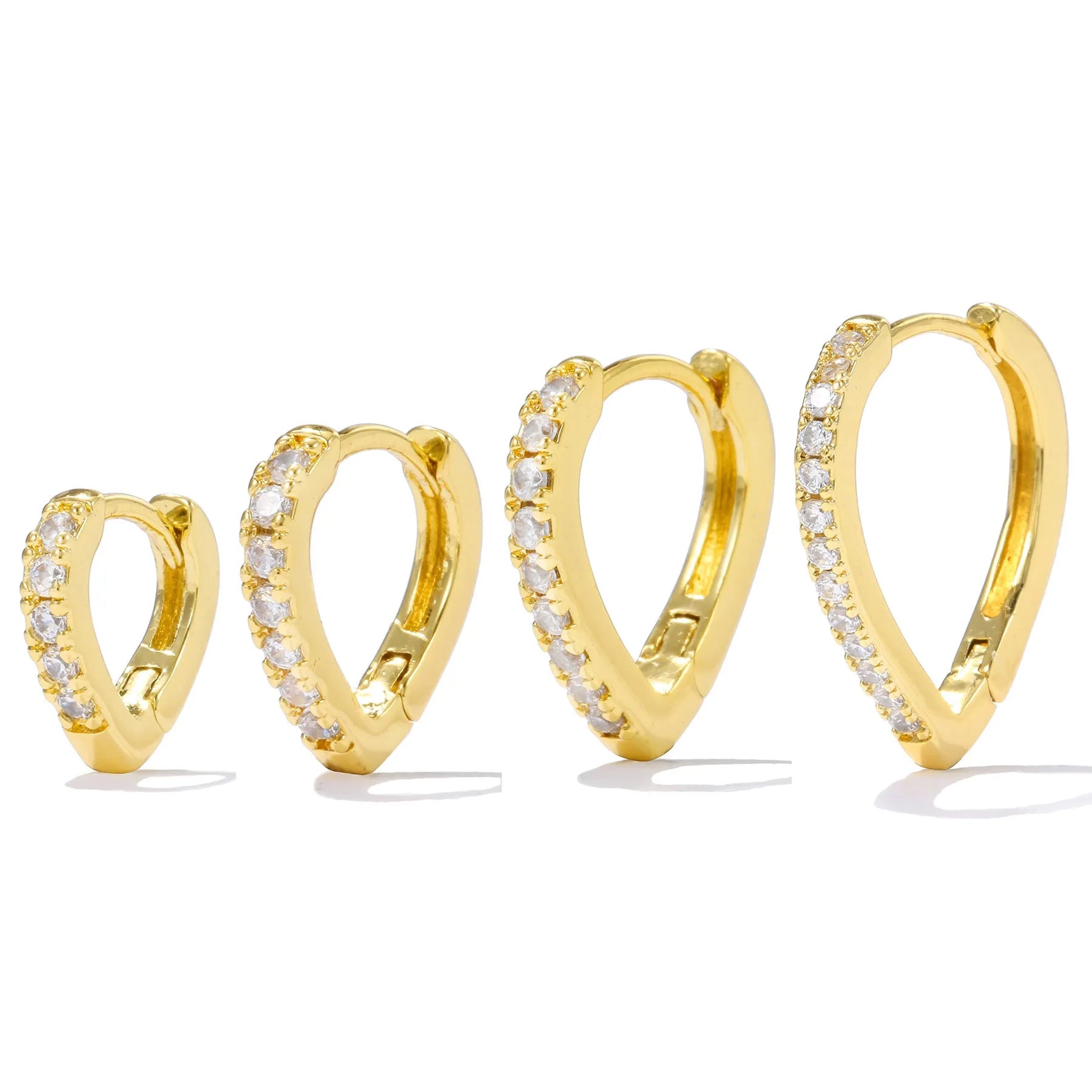 A geometric heart-shaped ear clip for women in electroplated copper, shown in gold and white K colour options.