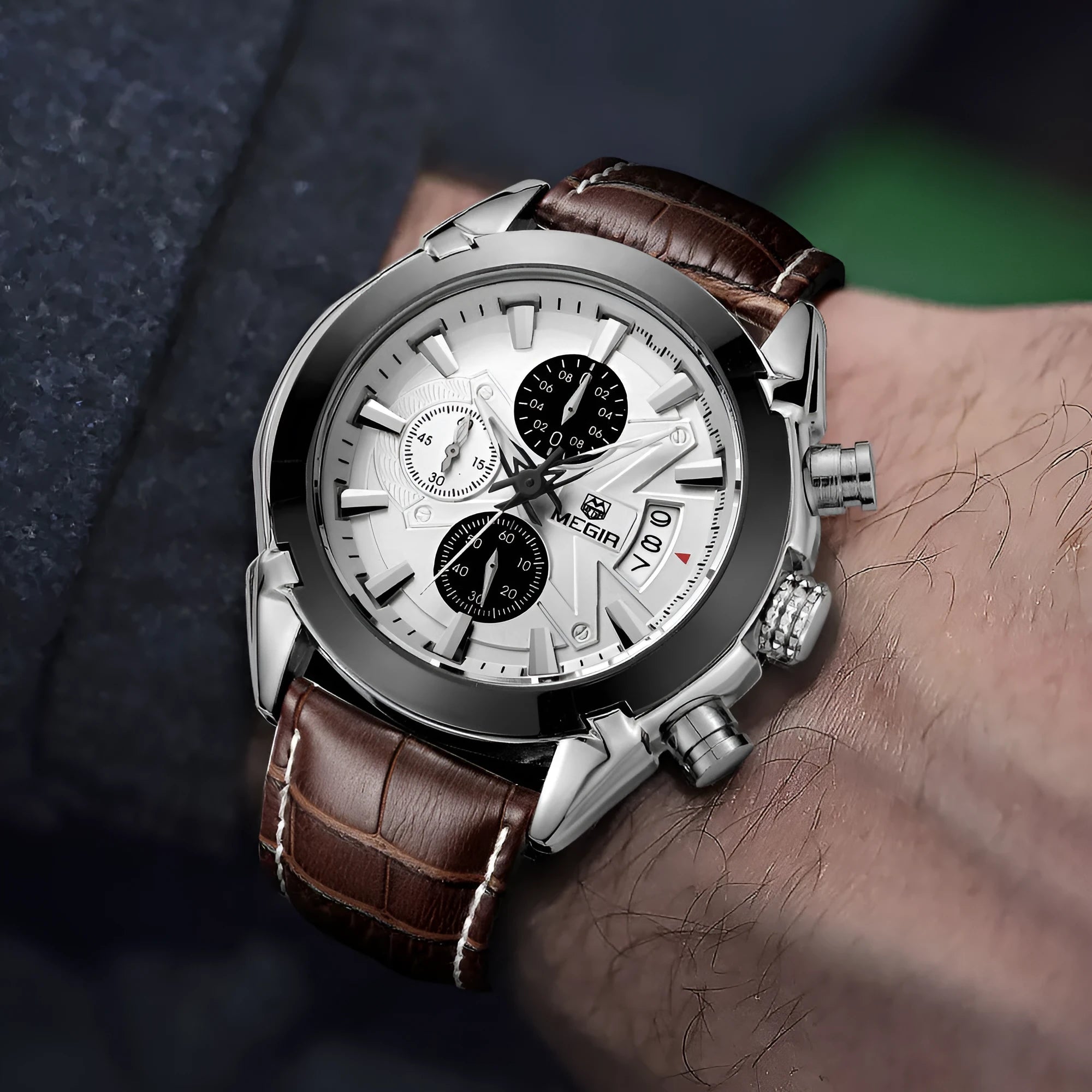 Men's brown and white dial chronograph watch with three subdials and luminous hands on a black strap.