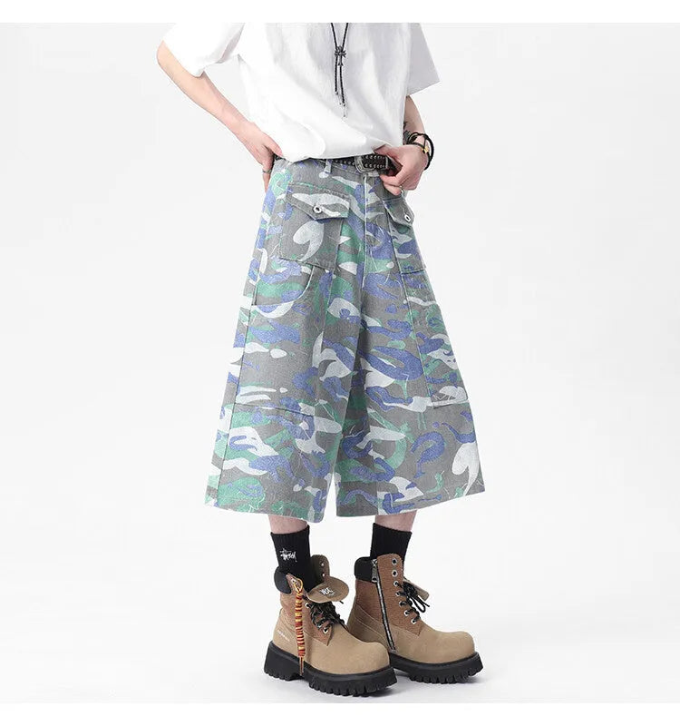 Men's camouflage green cotton cargo trousers with a straight cropped leg and a cargo pocket.