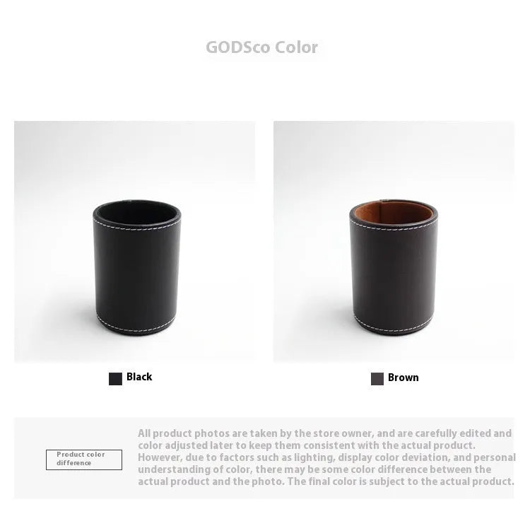 Small round black leather pen container for desk organisation.